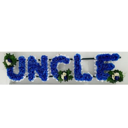 Beautiful Artificial Silk Grave Pot Funeral Tribute – Custom Memorial Flowers for Mum, Dad, Son & Loved Ones Honor the memory of your loved ones with our handmade Artificial Silk Grave Pot Funeral Tribute. Featuring a stunning arrangement of lifelike yellow roses, orange and ivory chrysanthemums, and lush foliage, this tribute is thoughtfully designed to create a serene and lasting memorial at the graveside. Key Features: Handcrafted Elegance: Each arrangement is carefully handmade, ensuring a unique and personalized touch every time. Customizable Options: Choose from a range of colors to match your preferences or create a meaningful tribute. Perfect Dimensions: Includes a sturdy, standard-sized plastic grave pot measuring 10cm, with the complete arrangement standing approximately 25cm tall. Durable & Long-Lasting: Made with high-quality artificial silk flowers to withstand outdoor elements, providing a lasting tribute. Why Choose Us? Personalization: Tailor your arrangement with your choice of colors for a truly unique memorial. Variety: Explore our shop for additional options, including name tributes, hearts, wreaths, pillows, and rings. Fast Dispatch: Most orders are shipped the next working day if placed before 6 PM, ensuring timely delivery for important occasions. Urgent Requests: Need it sooner? Contact us for same-day preparation to meet time-sensitive needs. Please note: As these items are handmade, slight variations may occur, but we strive to closely match the images in the listing. Create a heartfelt tribute that reflects your love and cherished memories. Order your Artificial Silk Grave Pot Memorial Tribute today for a meaningful and enduring gesture.